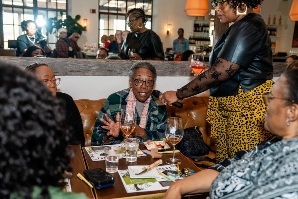 women’s empowerment event Hamptons candid audience interaction